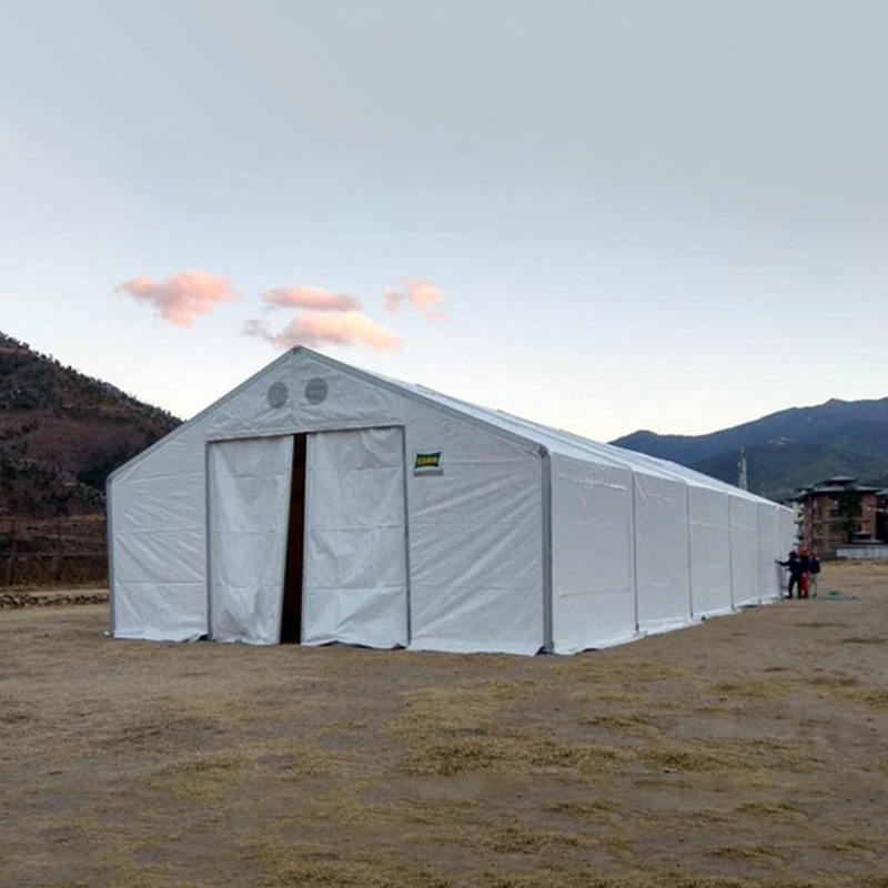 IFRC/ICRC/WFP/IOM vakiopaloa hidastavat UV-suojatut 10 x 24 m:n teltan siirrettävät säilytysyksiköt (MSU)
