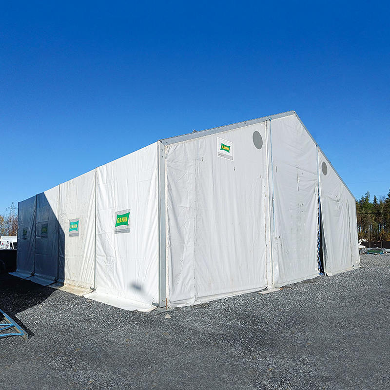IFRC/ICRC/WFP/IOM vakiopaloa hidastavat UV-suojatut 10 x 24 m:n teltan siirrettävät säilytysyksiköt (MSU)