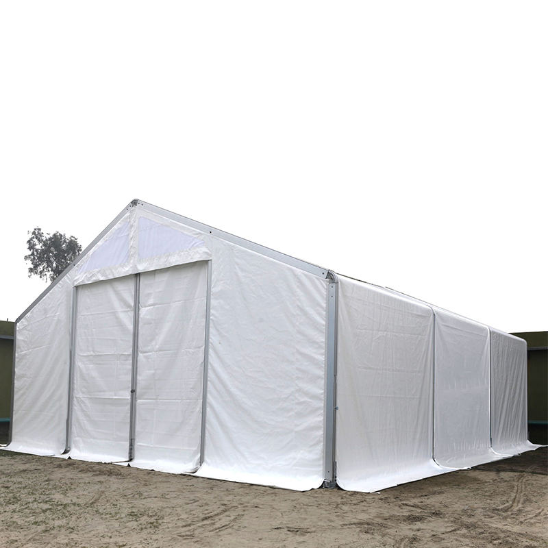 IFRC/ICRC/WFP/IOM vakiopaloa hidastavat UV-suojatut 10 x 24 m:n teltan siirrettävät säilytysyksiköt (MSU)